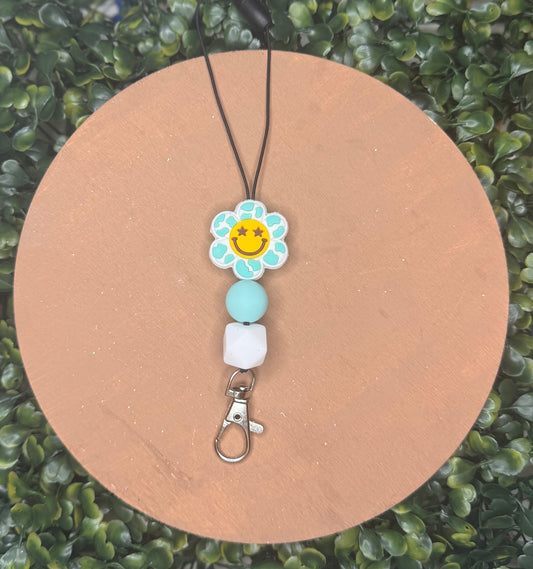 Teal flower smiley freshie hanger
